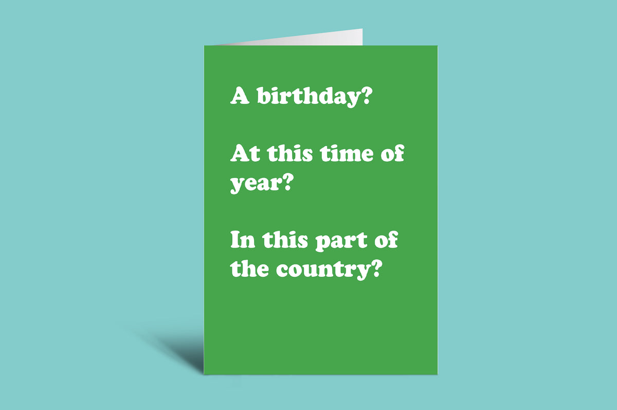 Green birthday card with humorous text on a teal background