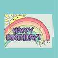 Happy Birthday card with rainbow and sun illustration on a teal background