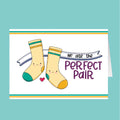 Card with cartoon socks and text 'we are the perfect pair' on a teal background