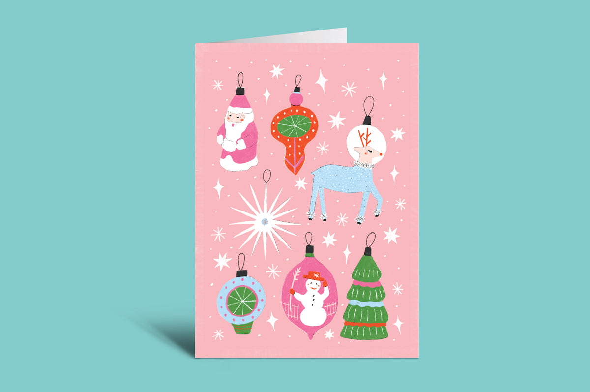 Pink greeting card with festive illustrations on a green background