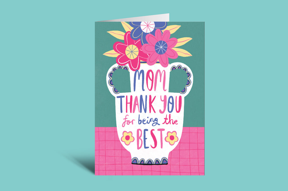 Colorful card with floral design and text on a green background