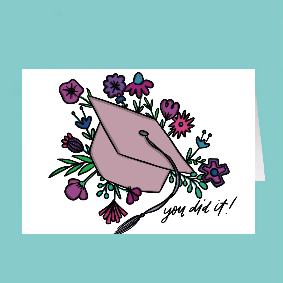 Graduation cap with flowers and 'you did it!' text on a teal background