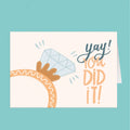 Card with a diamond and 'yay! You did it!' text on a teal background
