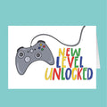 Greeting card with a gaming controller and 'New Level Unlocked' text on a teal background