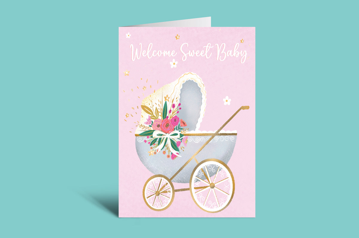 Baby shower card with baby carriage and floral design on a pink background