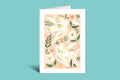 Greeting card with floral design and text on a green background
