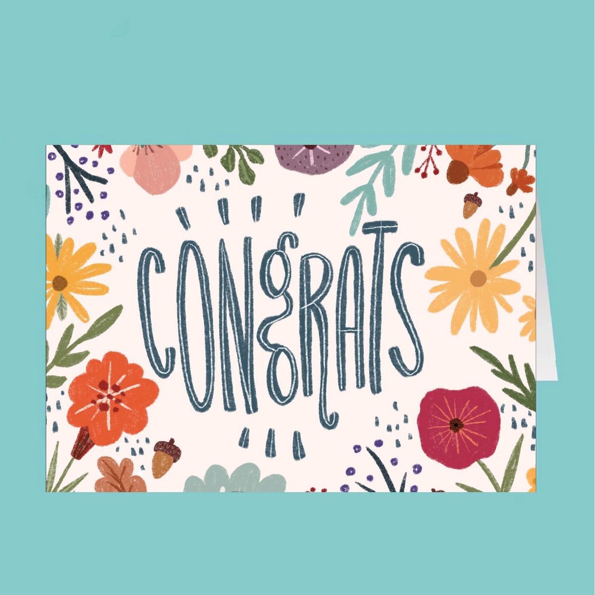 Greeting card with floral design and 'CONGRATS' text on a teal background