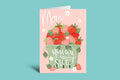 Greeting card for Mother's Day with strawberries and text on a pink background