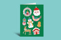 Christmas-themed greeting card with festive illustrations on a green background