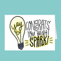 Light bulb illustration with 'Congrats, you bright spark!' text on a teal background