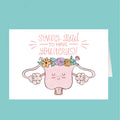Card with a cartoon uterus illustration and floral decorations on a teal background