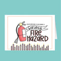 Card with a fire extinguisher and candles design, text 'Your birthday is becoming a serious fire hazard' on a teal background.