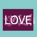 Card with 'LOVE' text surrounded by floral designs on a purple background