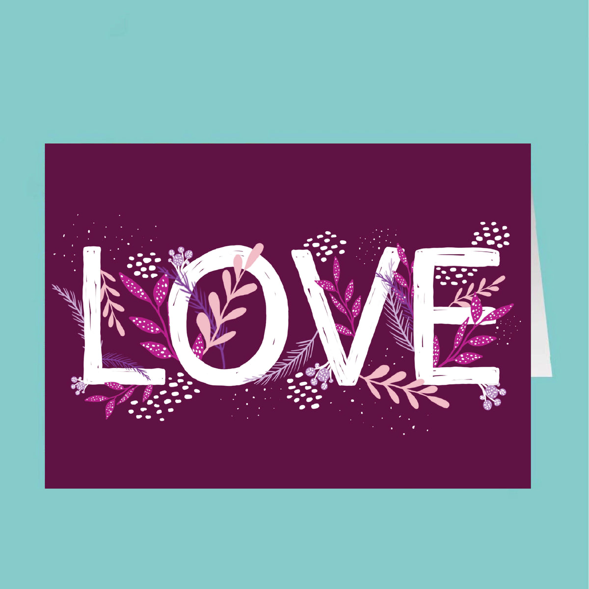 Card with 'LOVE' text surrounded by floral designs on a purple background